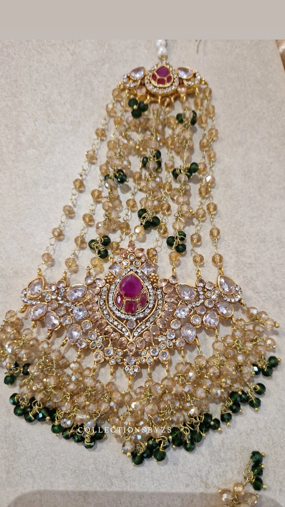 JAAN-  Luxury Pakistani Intricate Earrings with Sahara's, Tikka, Jhumar Set- DARK GREEN AND GOLD.
