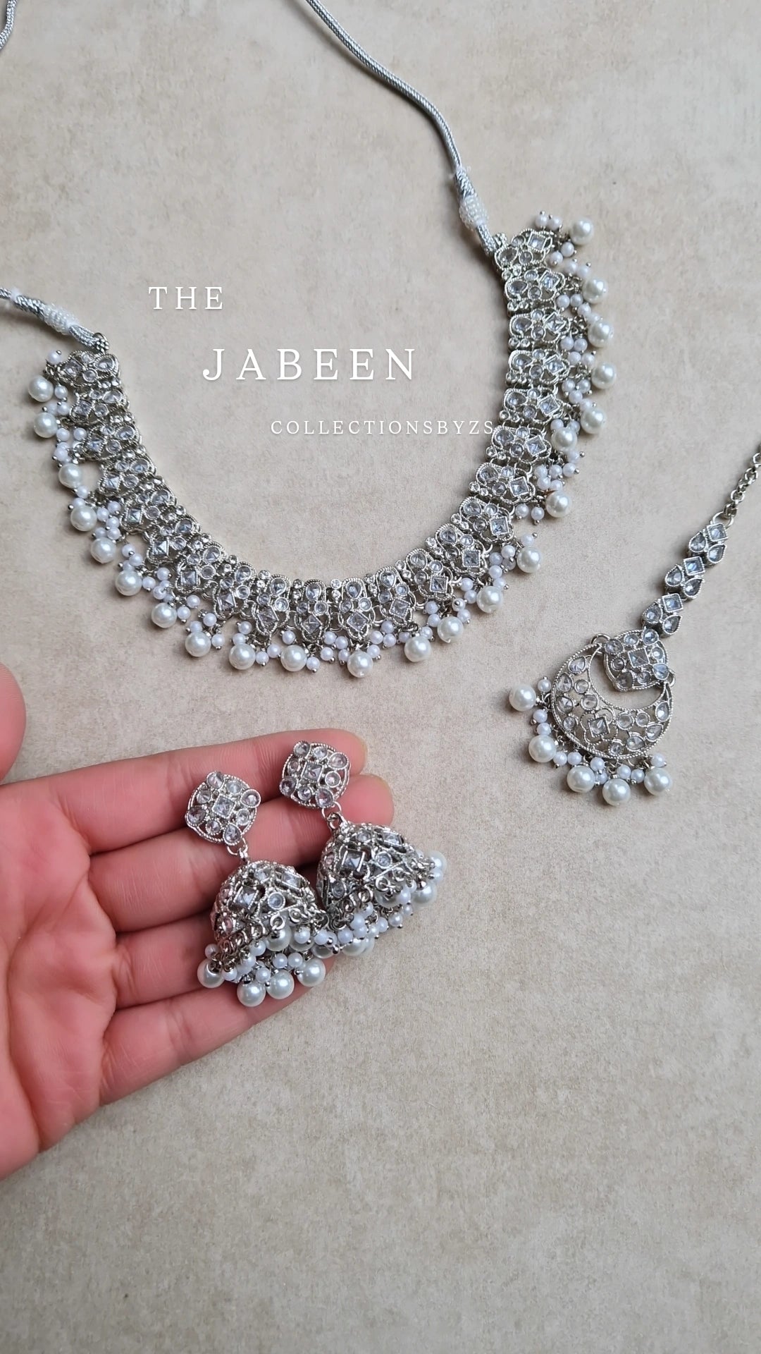 JABEEN- Reverse AD Silver and White Jewellery Set
