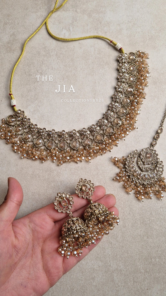 JIA:- Reverse AD Value Golden Indian Jewellery Set